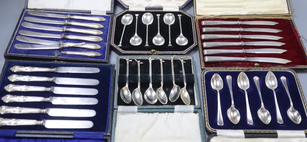 Six assorted cased sets of flatware comprising three sets of tea knives and three sets of teaspoons